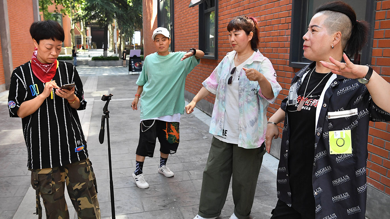 Female street dance group Huo Mei Gui – whose members range in age from 45 to 71 – are among those sharing their work digitally (Xinhua/Li An)